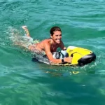 Girl smiling when using a Seabob F5 customize color